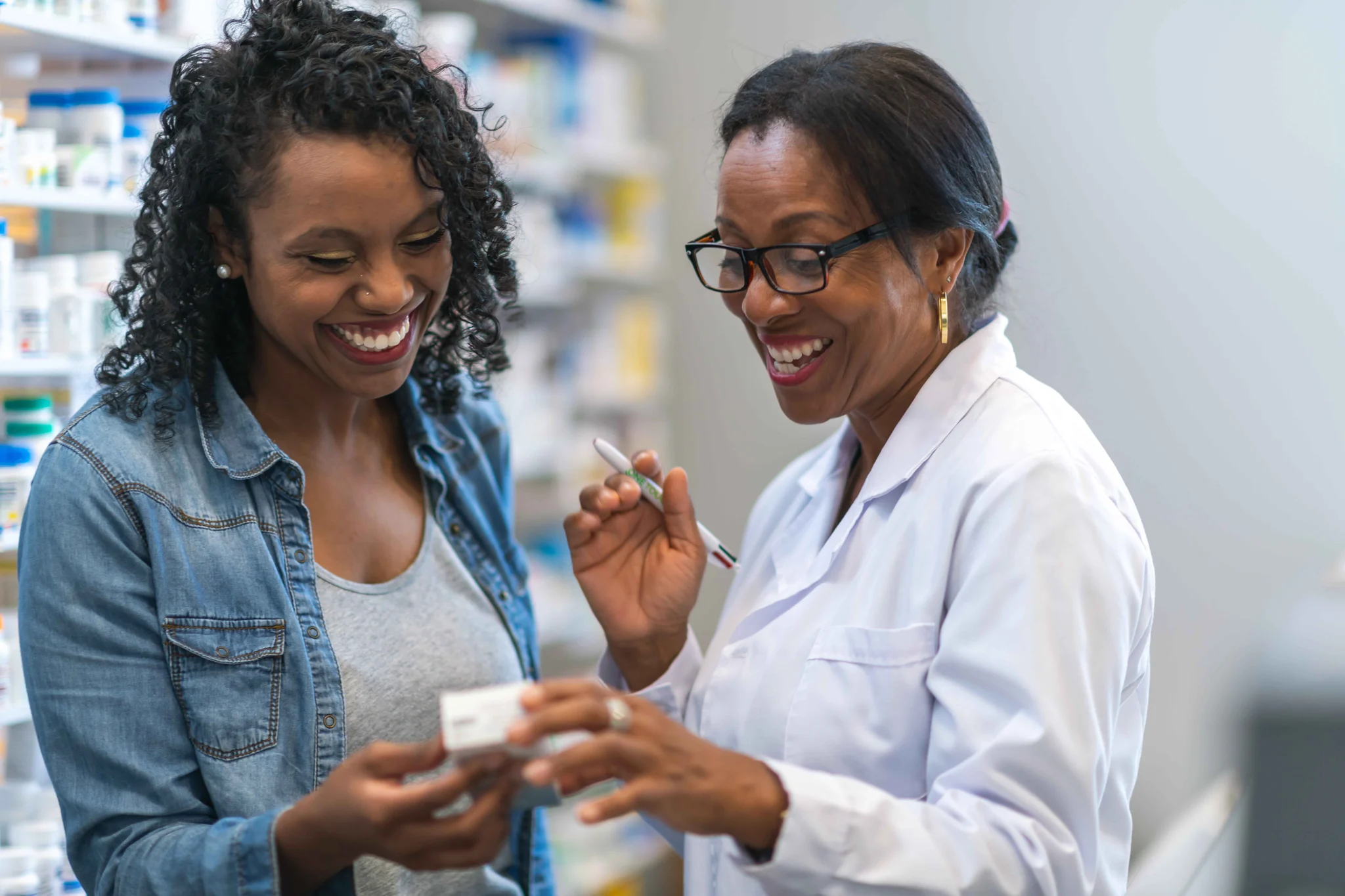 Pharmacist working with a patient
