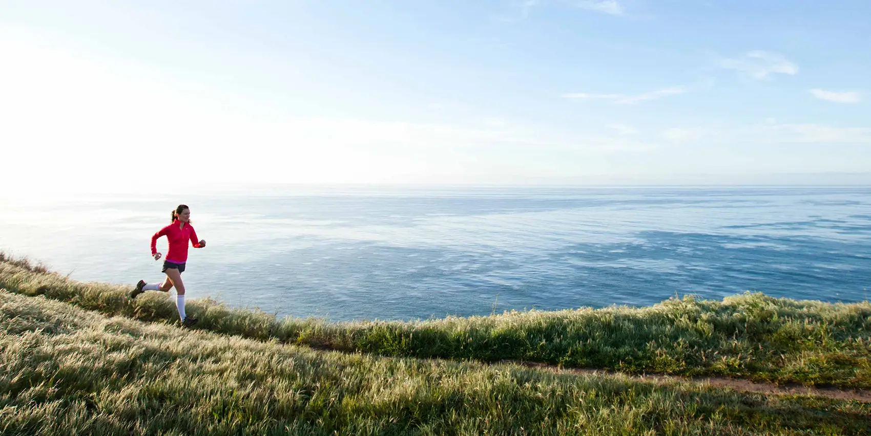 Trail runner on the coast